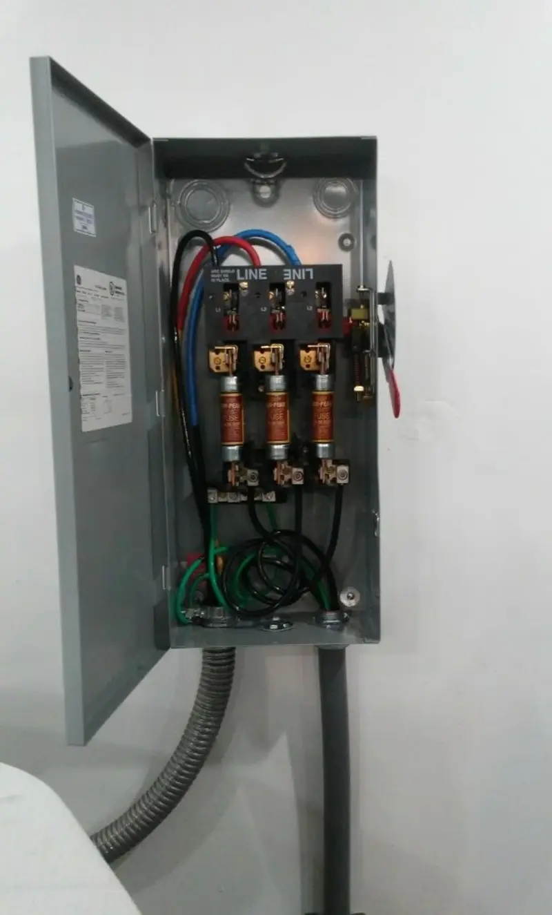 Three-phase disconnect switch installed for Smoke Detector Installation in Rice Lake
